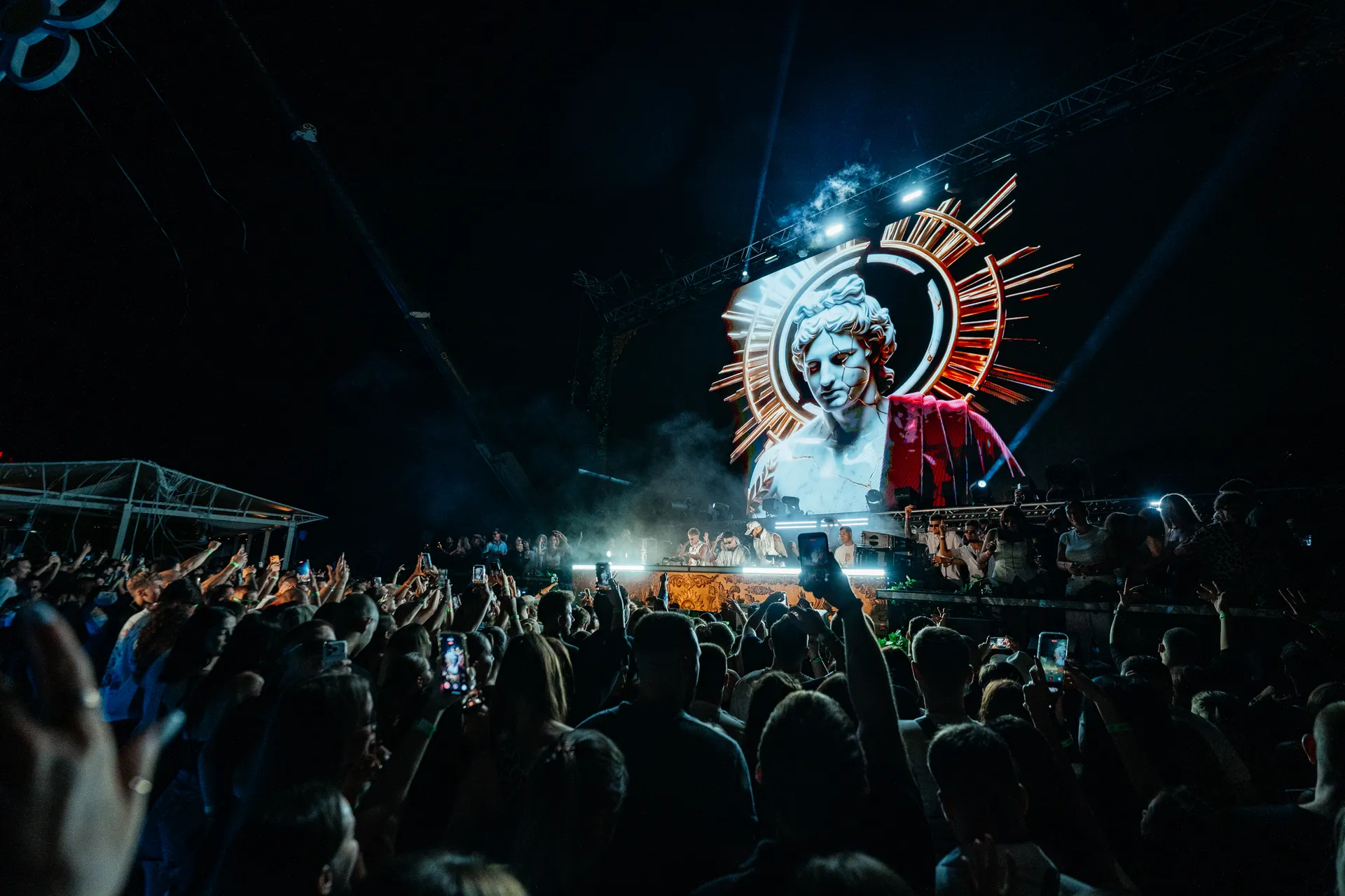 Awakening of Eras — classical statue with halo on the LED wall