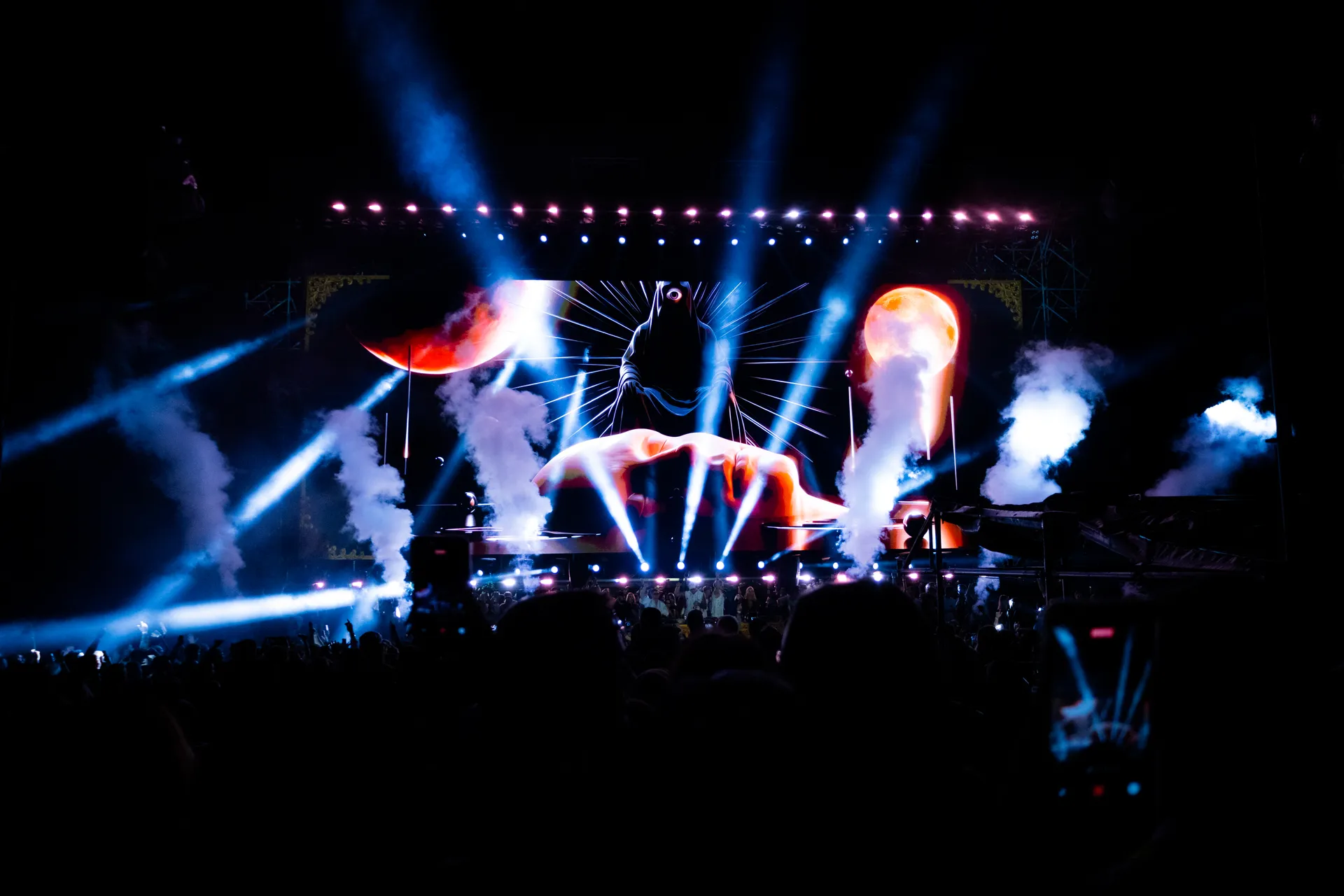 Awakening of Eras — moon and figure on the LED wall